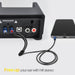 Audio equipment with cables connected to a laptop on a white background.