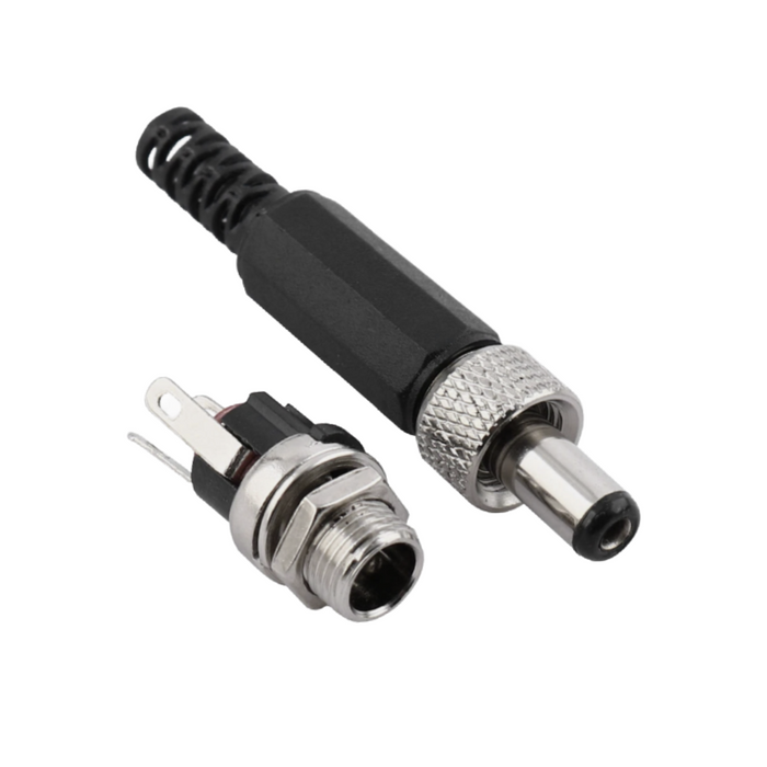 Two connectors, one black and one silver, on a white background